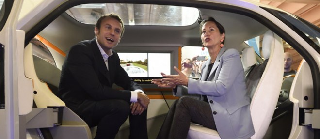Emmanuel Macron et Segolene Royal au Mondial de l'automobile, le 4 octobre 2014 a Paris.