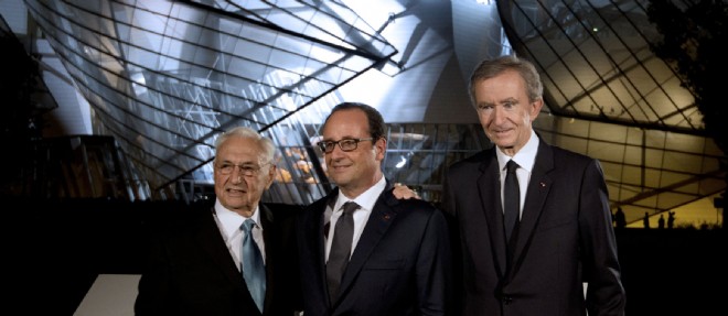 Francois Hollande a inaugure la Fondation Louis Vuitton en compagnie de Bernard Arnault et de l'architecte Frank Gehry.