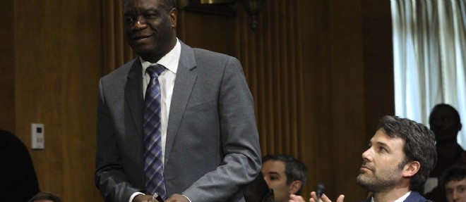 Le Dr Mukwege, fondateur de l'hopital Panzi en RD Congo, applaudi au Capitole par l'acteur Ben Affleck.