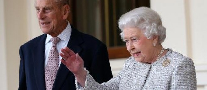 La reine Elizabeth II d'Angleterre et son epoux, le prince Philip, duc d'Edimbourg, au palais de Buckingham a Londres, le 23 octobre 2014