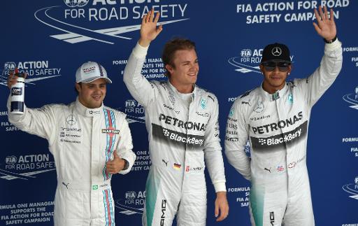 Le trio de pilotes arrivés en tête des essais qualificatifs du GP du Brésil, de gauche à droite: Felipe Massa (Williams), Nico Rosberg (Mercedes-AMG) et Lewis Hamilton (Mercedes-AMG), le 8 novembre 2014 à Interlagos ©  AFP