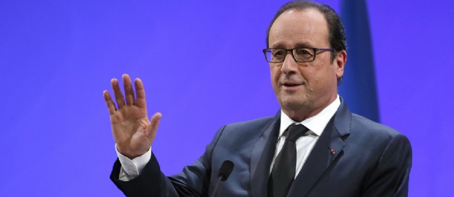 Francois Hollande lors de la ceremonie de remise des prix de la Fondation Jacques Chirac, le 21 novembre 2014, au musee du Quai Branly a Paris.