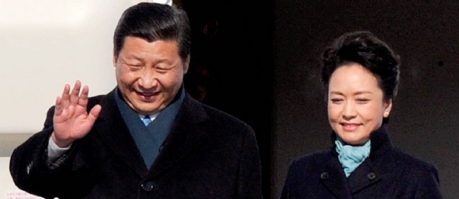 Le president Xi Jinping et son epouse Peng Liyuan font l'objet d'un culte de la personnalite grandissant en Chine.