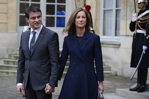 Le Premier ministre français Manuel Valls et son épouse Anne Gravoin à l'Hôtel Matignon le 3 décembre 2014 à Paris © Joël Saget AFP
