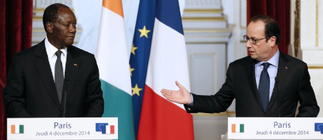 Alassane Ouattara et Francois Hollande a l'Elysee, le 4 decembre 2014.