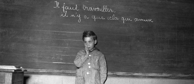 En octobre 1949, dans une ecole primaire de garcons francaise.