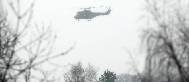 Cinq helicopteres survolent la zone.