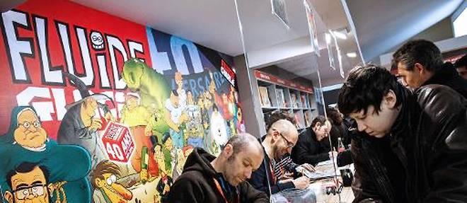 Seance de dedicaces au 42e Festival international de la bande dessinee d'Angouleme, le 30 janvier 2015