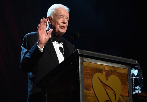L'ancien président des Etats-Unis Jimmy Carter fait un discours lors du gala de charité lors duquel un hommage a été spécialement rendu à l'auteur-compositeur américain Bob Dylan, le 6 février 2015, à Los Angeles, en Californie © Larry Busacca Getty/AFP