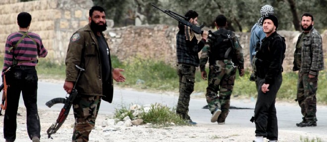 Photo d'illustration. Des combattants djihadistes pres d'Alep, en Syrie.