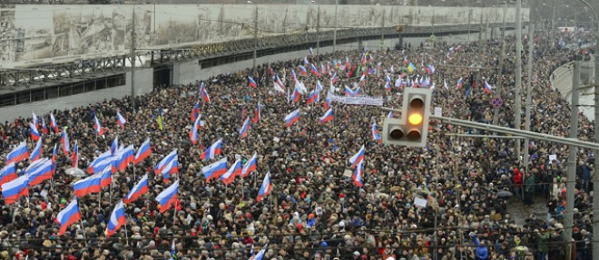 Entre 21 000 et 70 000 personnes ont participe ce dimanche a Moscou a la marche en hommage a l'opposant Boris Nemtsov, assassine vendredi dans la capitale russe.