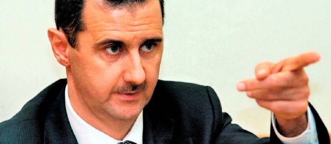 Pour le Premier ministre turc, "si vous vous mettez a la table (de negociations) avec el-Assad et que vous lui serrez la main, l'Histoire ne le pardonnera jamais".