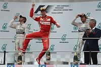 Vettel (Ferrari) a réussi l'exploit de prendre le meilleur sur les Mercedes d'Hamilton et de Rosberg.