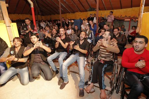 Des réfugiés syriens ont accueilli avec enthousiasme l'adaptation de "Roméo et Juliette" aux réalités de la guerre dans leur pays, jouée le 27 mars 2015 à Amman © - AFP