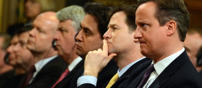 Le Premier ministre David Cameron (a droite), son allie le centriste Nick Clegg et Ed Miliband (a gauche), le leader travailliste le 27 fevrier 2014.