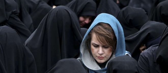 Des femmes iraniennes assistent aux celebrations marquant l'anniversaire de la mort de Fatima, la fille du prophete Mahomet.