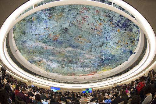Le 28e Conseil des droits de l'Homme se réunit sour le plafond peint par Miquel Barcelo au siège de l'ONU à Genève, le 2 mars 2015 © Richard Juilliart AFP/Archives