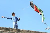 Le 15 mai, au camp d'Aïda à Bethléem, un jeune Palestinien joue avec un cerf-volant aux couleurs de la Palestine pour célébrer la Nakba. ©MUSA AL-SHAER