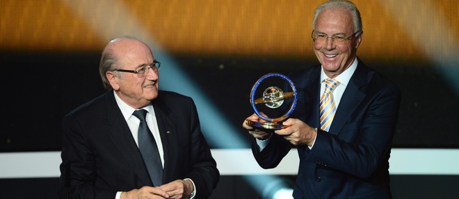 Franz Beckenbauer (a droite) etait a la tete du comite d'organisation du Mondial 2006.