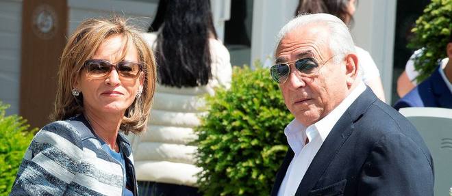 Dominique Strauss-Kahn et Myriam L'Aouffir a Roland-Garros, samedi.