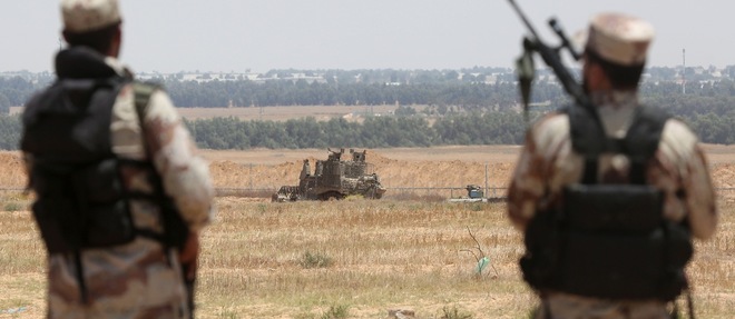 Des soldats palestiniens des brigades Ezzedine al-Qassam Brigades le 3 juin. Les tirs de roquettes pourraient provenir de groupes extremistes non controles par le Hamas. 
