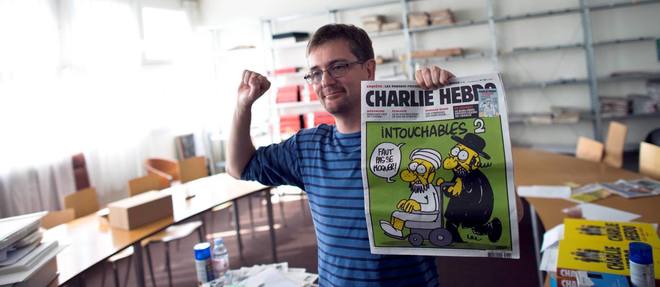 Charb dans les locaux de "Charlie Hebdo", en 2012.