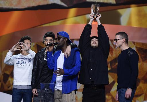 Le collectif 1995, dont fait partie le rappeur Nekfeu, recompense par une Victoire de la musique le 14 fevrier 2014 au Zenith, a Paris