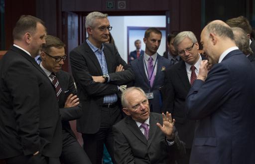 Le ministre allemand des Finances Wolfgang Schauble (c) lors d'une reunion de l'Eurogroupe a Bruxelles, le 27 juin 2015