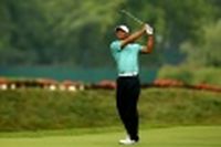 Golf: Woods retrouve le sourire au Greenbrier Classic