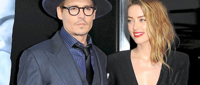 La femme de Johnny Depp, Amber Heard, sera jugee en Australie pour avoir fait entrer sur le territoire australien ses chiens Pistol et Boo sans les declarer.