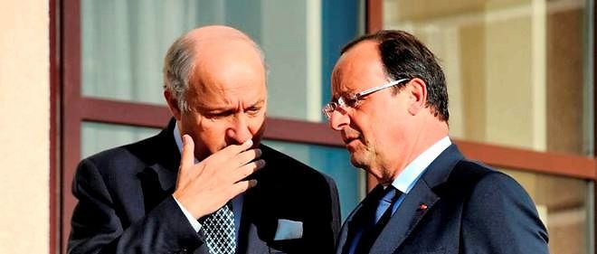 Francois Hollande et son ministre des affaires etrangeres Laurent Fabius.