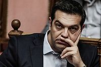 Le Premier ministre Alexis Tsipras doit faire face a la division de son parti, Syriza. Il depend de l'opposition pour faire appliquer le plan europeen. (C)DIMITRI MESSINIS