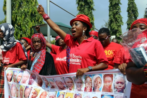 Des membres du mouvement "Bring back our girls" ("Rendez-nous nos filles") militent, le 8 juillet 2015, pour la liberation des 219 lyceennes enlevees par Boko Haram au Nigeria