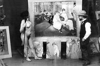 Toulouse-Lautrec devant son tableau Le Salon de la rue des Moulins.
