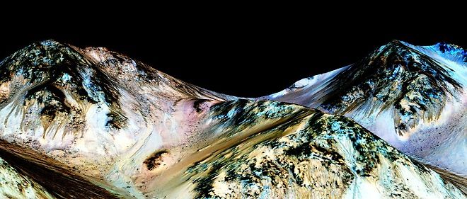 La Nasa ignore encore d'ou vient cette  eau responsable de ces trainees qui apparaissent sur des pentes abruptes  a certains endroits de la Planete rouge.