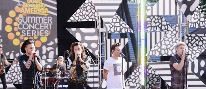 (g-d): Liam Payne, Harry Styles, Louis Tomlinson et Niall Horan du groupe britannique One Direction, en concert a Central Park, le 4 aout 2015 a New York