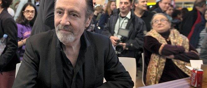 Michel Delpech, le 22 mars 2014, au Salon du livre de Paris.