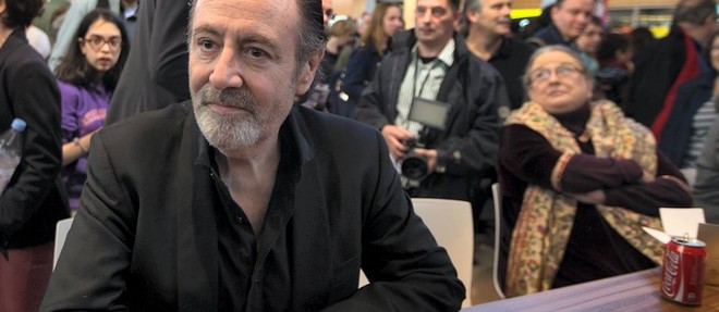 Michel Delpech, le 22 mars 2014, au Salon du livre de Paris.