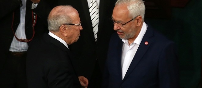 Beji Caid Essebsi et Rached Ghannouchi lors de la premiere session de l'Assemblee des representants du peuple (ARP) le 2 decembre 2014. Ils sont desormais les maitres du jeu politique en Tunisie.