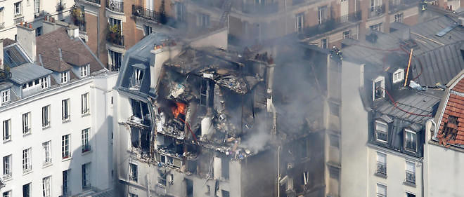 La deflagration survenue vendredi a la mi-journee a souffle les etages superieurs de cet immeuble du 6e arrondissement de Paris. 