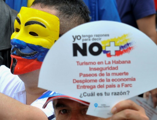 Les manifestants sont descendus dans les rues d'une vingtaine de villes (ici à Bogota), vêtus de jaune, rouge et bleu, les trois couleurs nationales. © GUILLERMO LEGARIA AFP