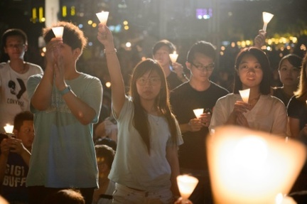 Des participants a la commemoration de la repression sanglante de la place Tiananmen, a Hong Kong le 4 juin 2016