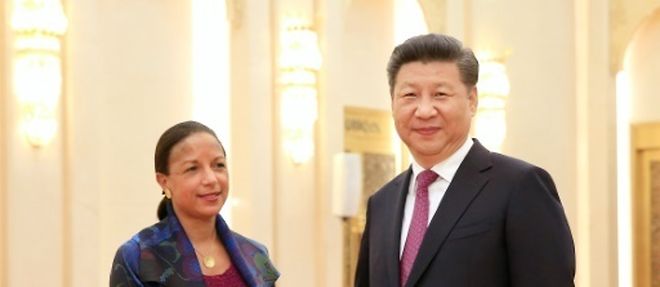 Susan Rice (a g.), conseillere a la securite du president Obama, et le president chinois, Xi Jinping (a d.), a Pekin le 25 juillet 2016 