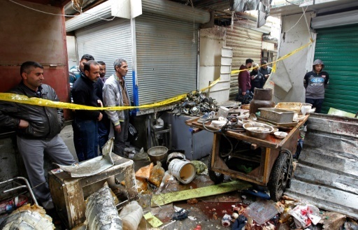 Scene de destruction apres un double attentat sur un marche de Bagdad, le 31 decembre 2016