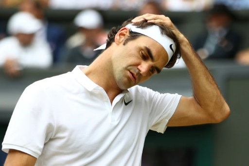 Le Suisse Roger Federer face au Canadien Milos Raonic en demi-finale à Wimbledon, le 8 juillet 2016 © LEON NEAL AFP/Archives