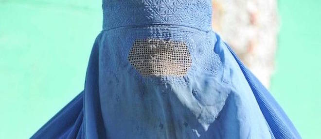 Une femme en burqa.