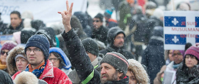 Le 5 fevrier, des Quebecois ont participe a une marche en solidarite avec les victimes de l'attentat raciste qui a vise la mosquee de Quebec le 29 janvier.
