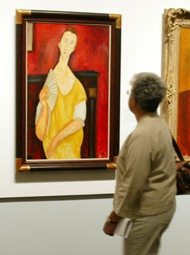 Le tableau "La Femme à l'éventail" d'Amedeo Mogliani, au musée juif de New York, le 21 mai 2004 © Don EMMERT AFP/Archives