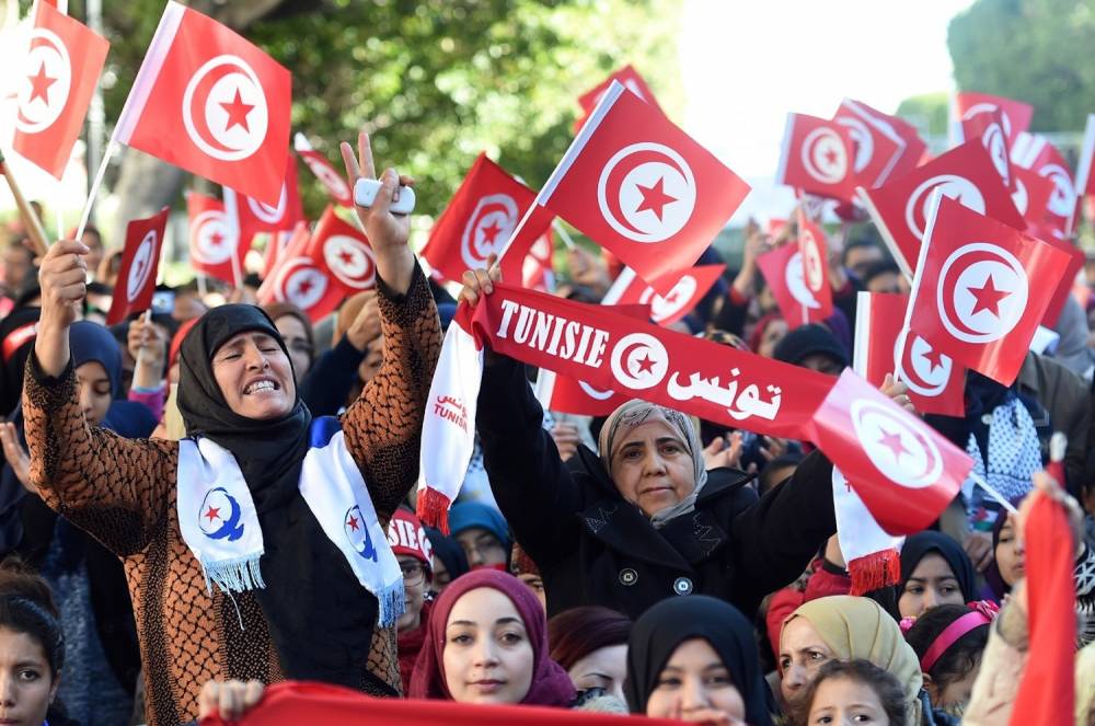 Des Tunisiennes defilent avenue Bourguiba pour marquer le 5e anniversaire de la revolution de 2011, ici le 14 janvier 2016. ©  AFP/Archives