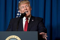US President Donald Trump delivers a statement on Syria from the Mar-a-Lago estate in West Palm Beach, Florida, on April 6, 2017.Trump ordered a massive military strike against a Syria Thursday in retaliation for a chemical weapons attack they blame on President Bashar al-Assad. A US official said 59 precision guided missiles hit Shayrat Airfield in Syria, where Washington believes Tuesday's deadly attack was launched. / AFP PHOTO / JIM WATSON ©JIM WATSON